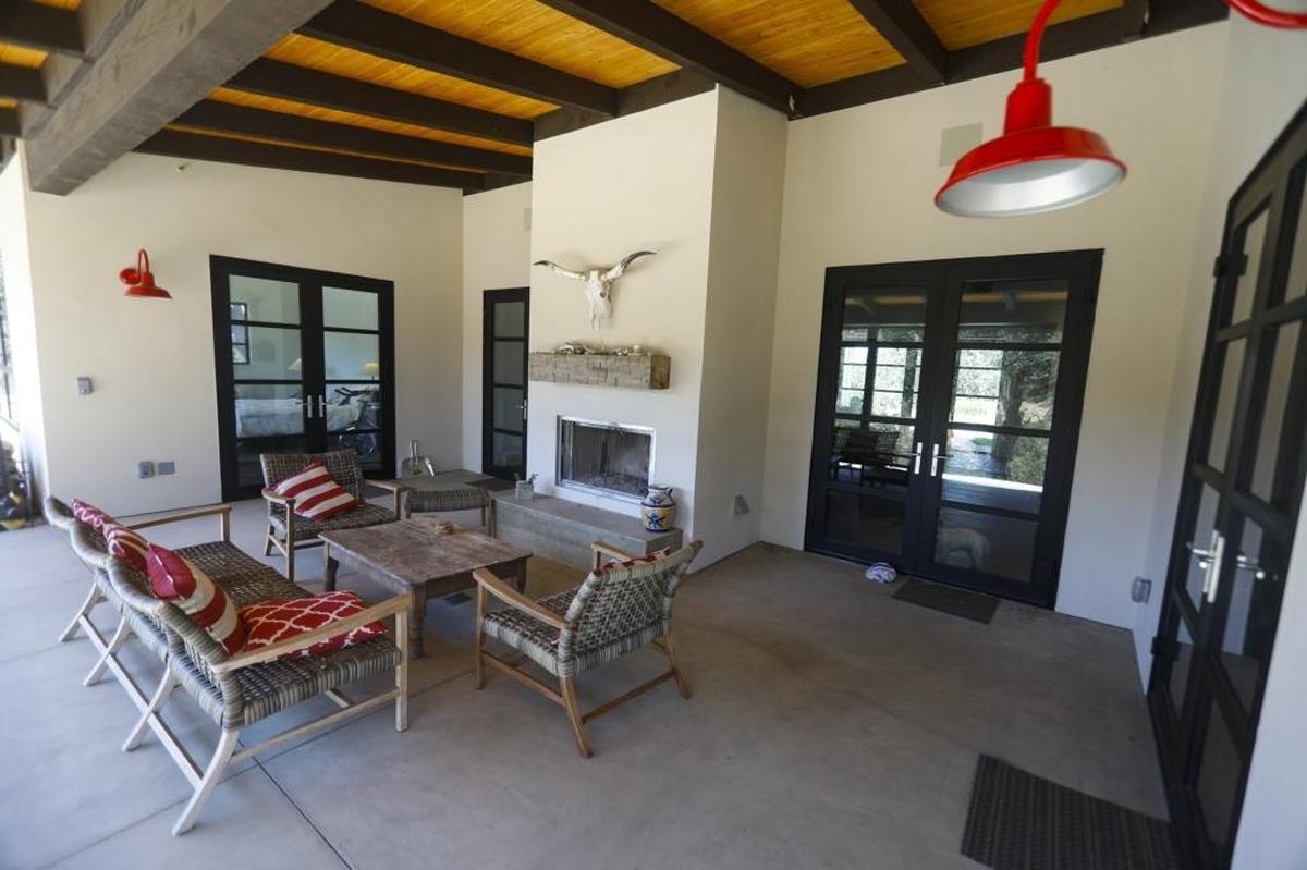 A covered patio serves as a second living room for Douglas and Anne Hilbert at their Paso Robles home.