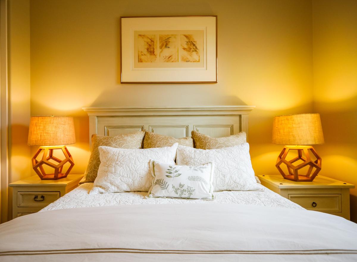 Lynn Randelman used paint and silver wax to help two mismatched pine nightstands blend with other furnishings in a guest room in her Nipomo home.