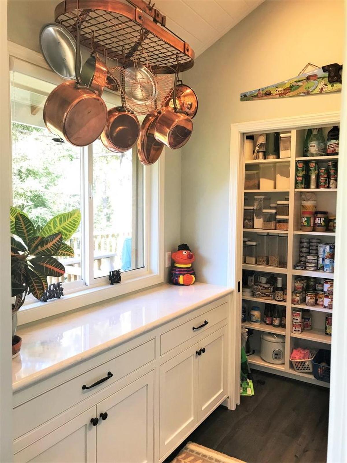 A butler’s pantry keeps messes out of sight when entertaining at the Clark home in Cambria.