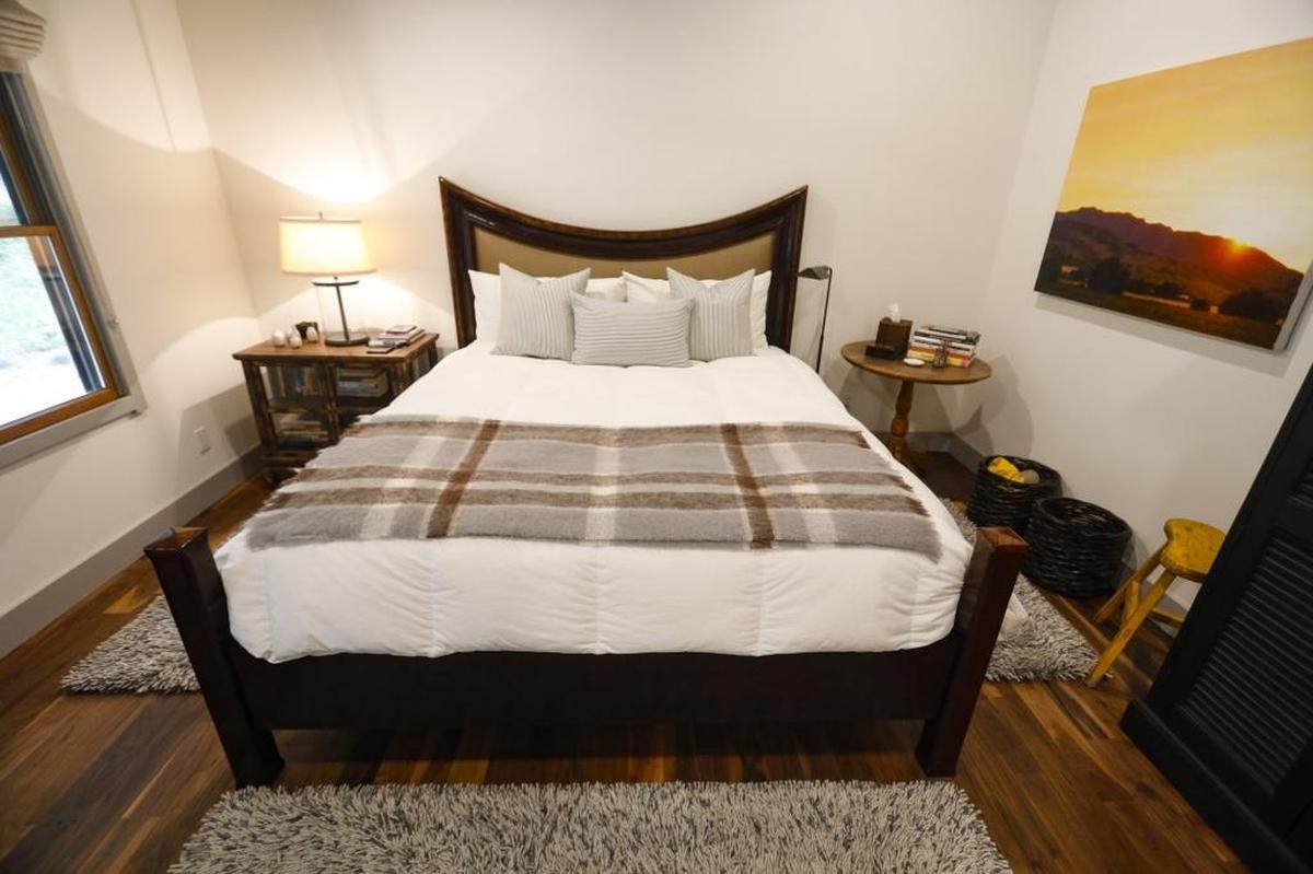 The master bedroom in the small ranch home that was renovated by Lizz Kluger and Michael Bonner.