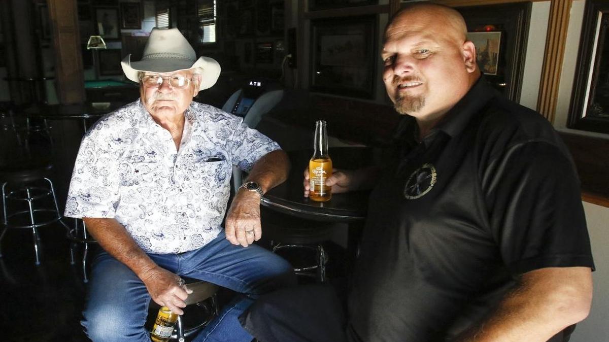 Ralph McCornack, left, and son Erik McCornack, at one of their favorite hangouts, the Pine Street Saloon in Paso Robles. Erik is a sixth-generation North County resident from a family of barley, grain and walnut farmers.