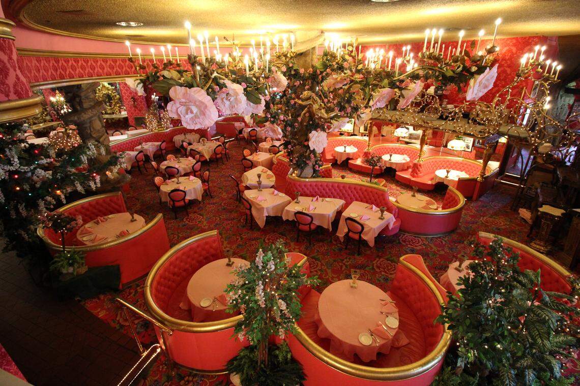 The Gold Rush Steak House at the Madonna Inn in San Luis Obispo serves food with pink napkins and pink goblets.