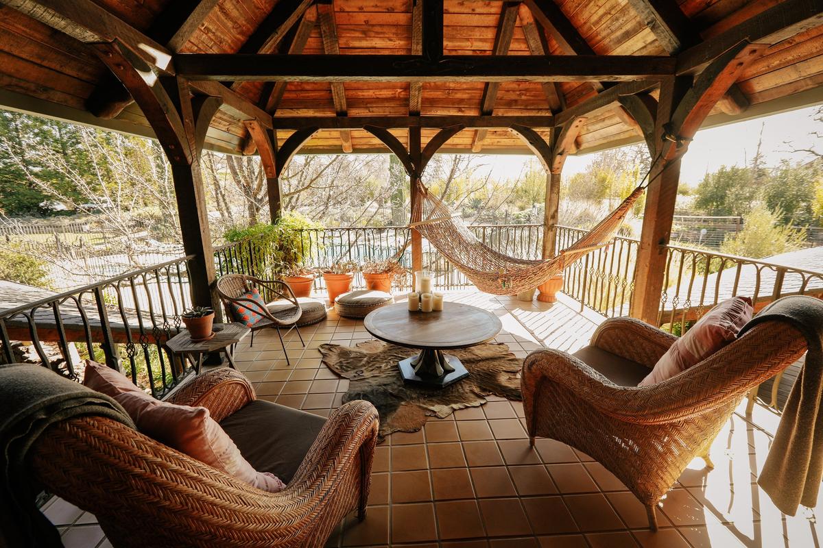 A rope hammock offers an inviting view of the pool at Inn Paradiso in Paso Robles.