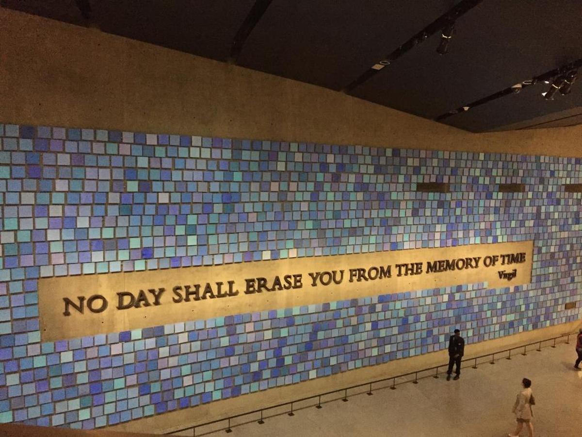 At the 9/11 Memorial and Museum in New York City, a quotation from Virgil — “No day shall erase you from the memory of time” — is surrounded by 2,983 individual squares of paper — one for every victim in the Sept. 11 attacks and the 1993 World Trade Center bombing — in the only work of art commissioned for the 9/11 Memorial, Spencer Finch’s “Trying To Remember the Color of the Sky on That September Morning.”