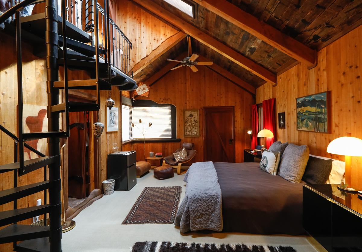 The Antoni Gaudi Loft at Inn Paradiso in Paso Robles features a rock-walled bathroom, spiral staircase and third-floor meditation space.