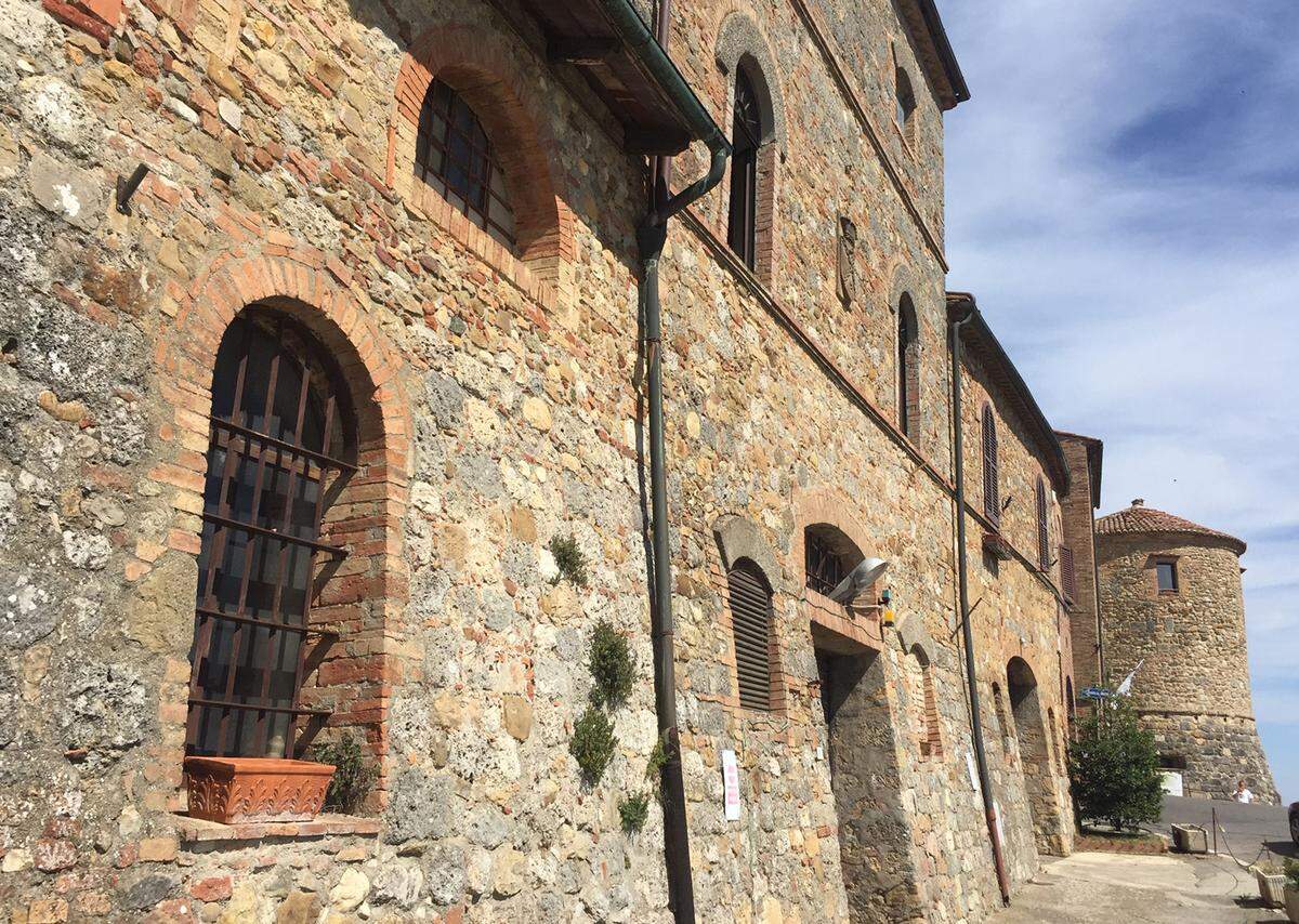 The walled medieval village of Casole d’Elsa, Italy, features plenty of picturesque buildings.