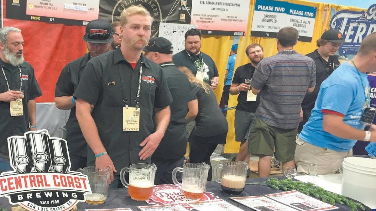 Central Coast Brewing’s Lucky Day IPA won a gold medal at the World Beer Cup in Philadelphia this month. Above, Skyler Oatman of San Luis Obispo mans the Central Coast Brewing booth at the Great American Beer Festival in Denver in September.