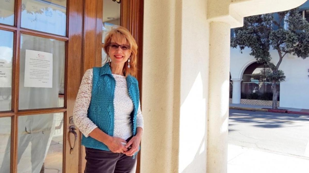 Jill-Marie Carre stands at the door of the new State Street storefront for Chocolats du CaliBressan, the shop she owns with her husband inside La Arcada in downtown Santa Barbara.