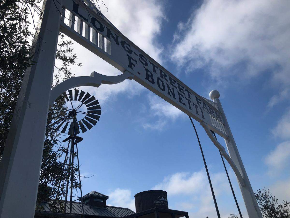A sign stands at the entrance of the new SLO Public Market at Bonetti Ranch in San Luis Obispo.