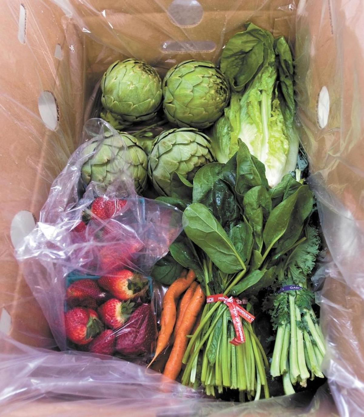 Talley Farms has a fresh produce subscription program called Fresh Harvest. This package contained avocado, carrots, kale, spinach, romaine lettuce, artichokes, fava beans and strawberries.