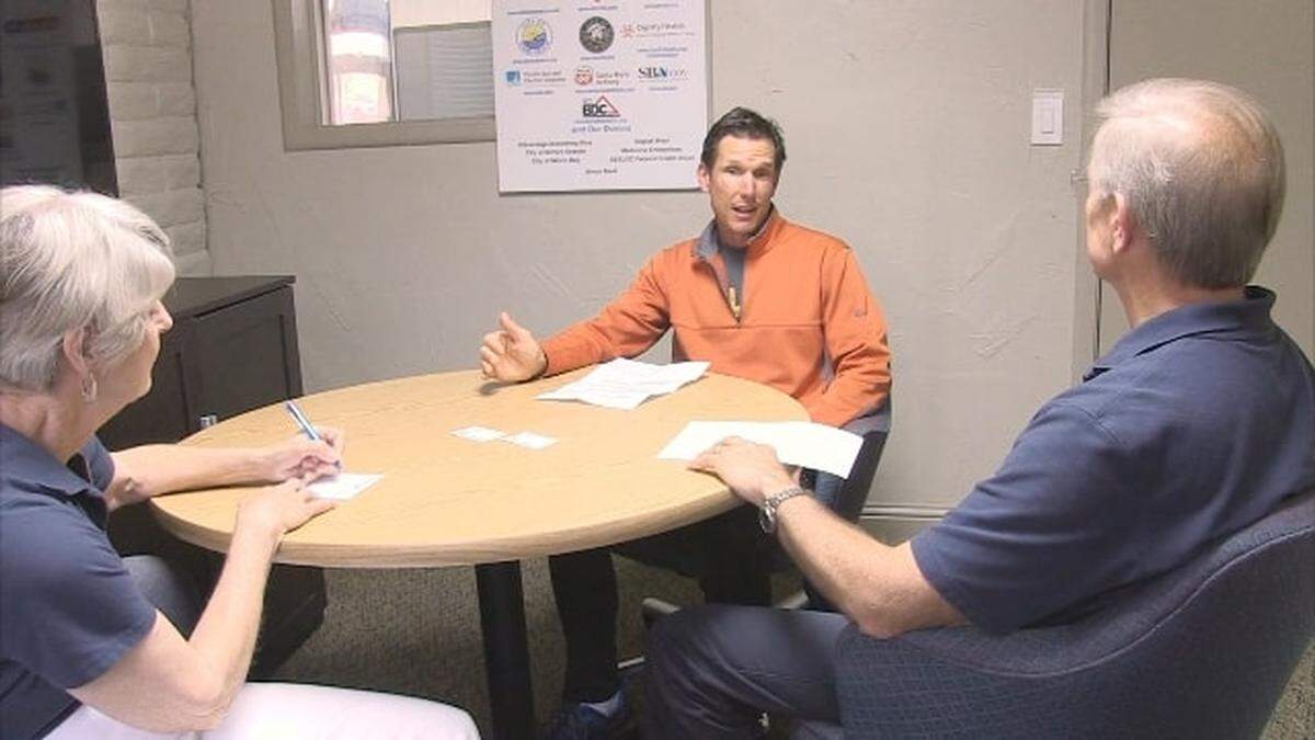 A SCORE mentoring session with John Hinds (in orange), owner of Cadence Insoles.