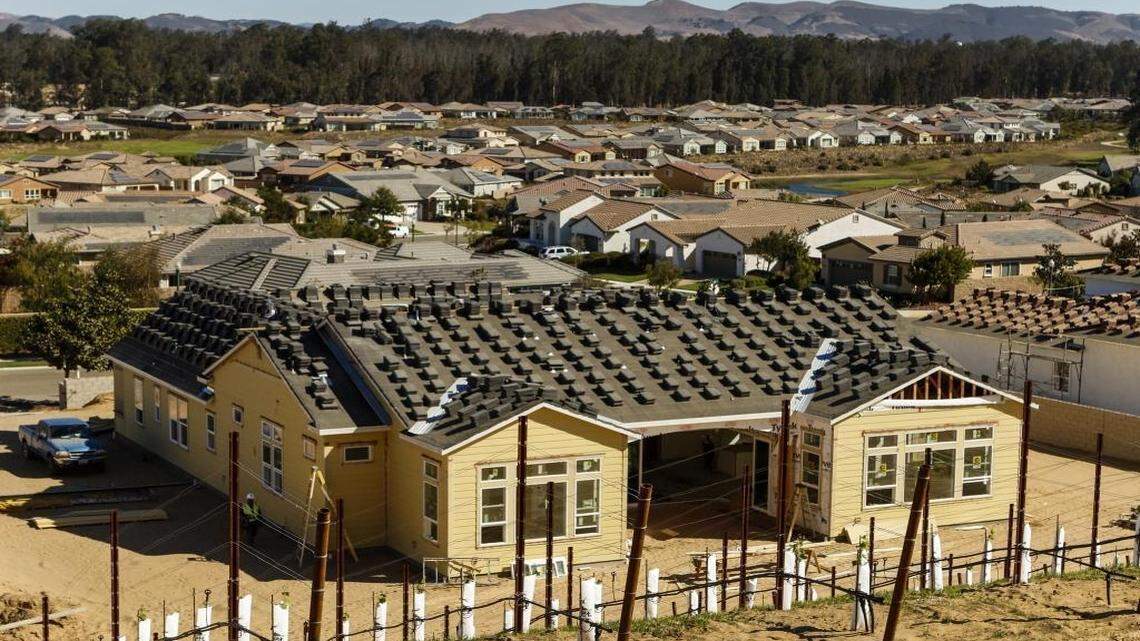This 2016 file photo shows new homes under construction at Monarch Dunes in Nipomo.