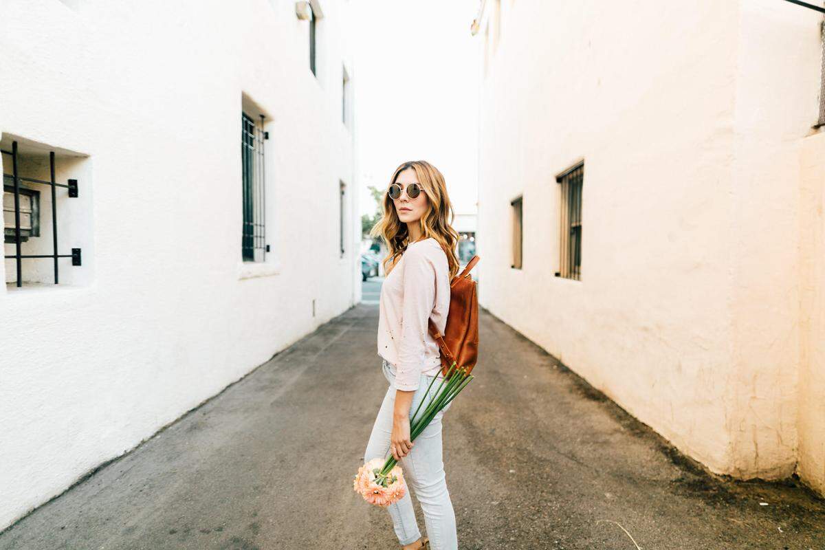 A model displays a bag handcrafted in Ethiopia and sold by the company Parker Clay.