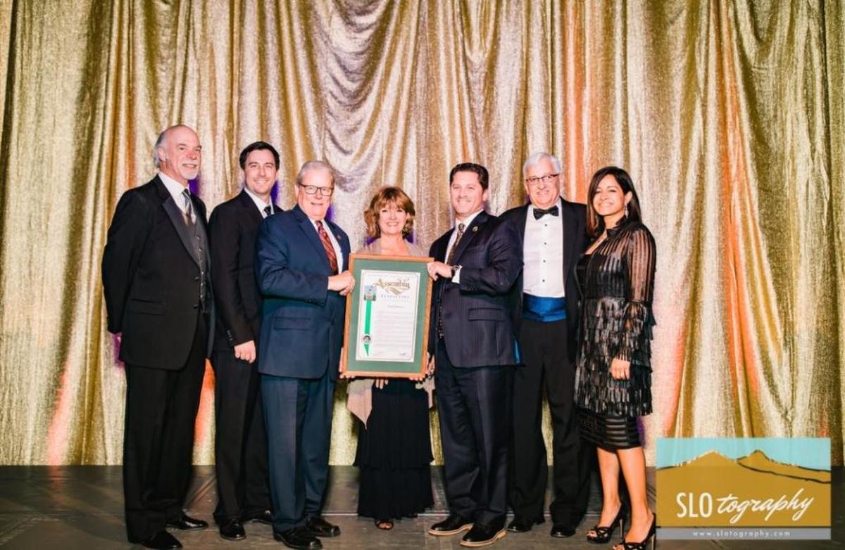 Anita Robinson, center, is the San Luis Obispo Chamber of Commerce’s 2017 Citizen of the Year.