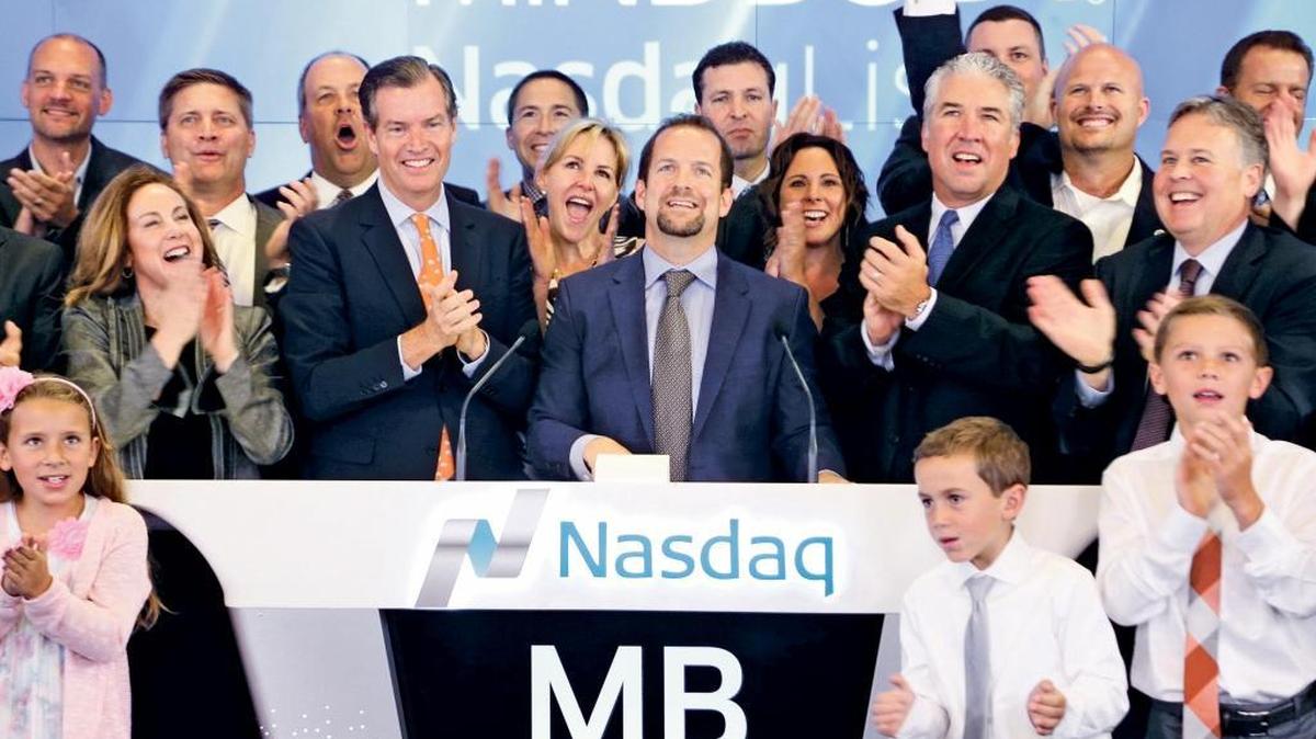 MindBody CEO Rick Stollmeyer rings the bell at the Nasdaq exchange on the first day of trading for his company’s stock in 2015.