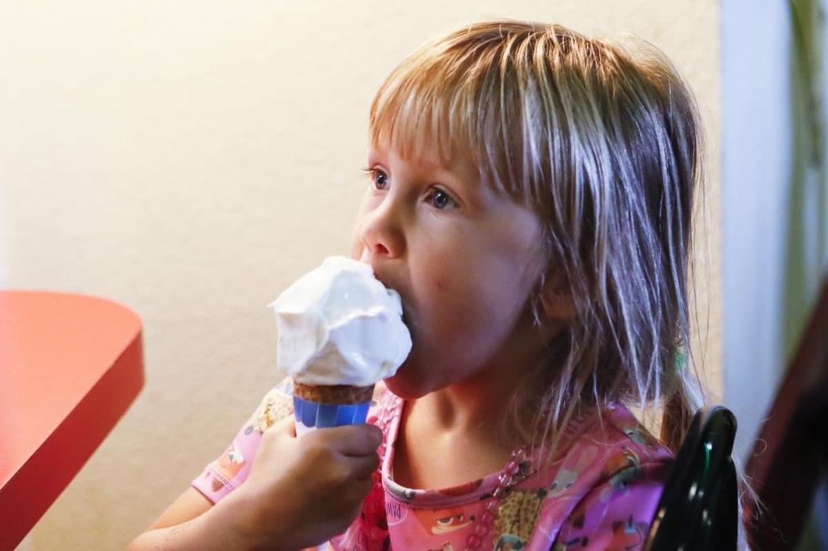 Gwyneth Young, 4, enjoys an ice cream cone purchased by her dad, Brandt, at Doc Burnstein’s Ice Cream Lab in Arroyo Grande in 2016.