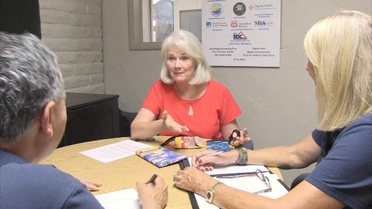 Carol Chenot of the Arroyo Grande-based company Lookie Loops meets with business mentors from the SLO County nonprofit SCORE.