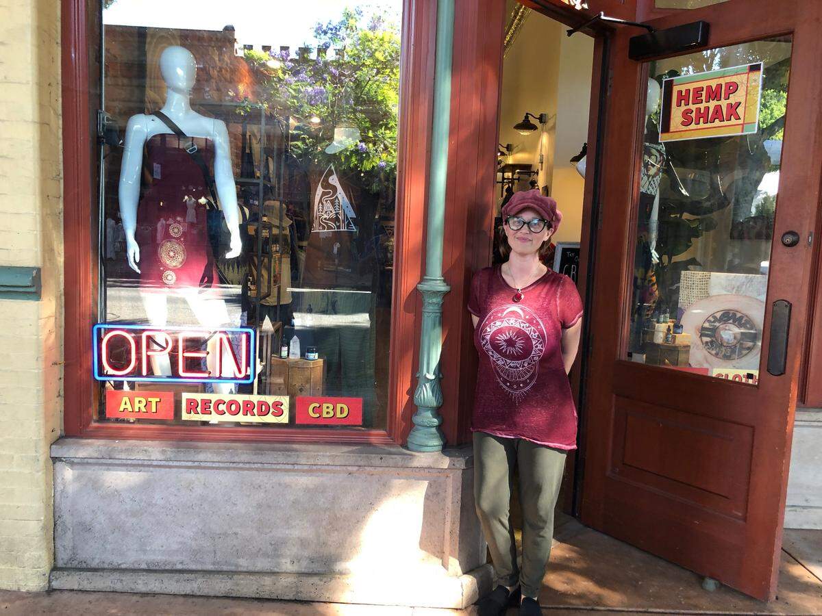 Katy Hemler stands outside of the new location of her store, Hemp Shak, in downtown San Luis Obispo.