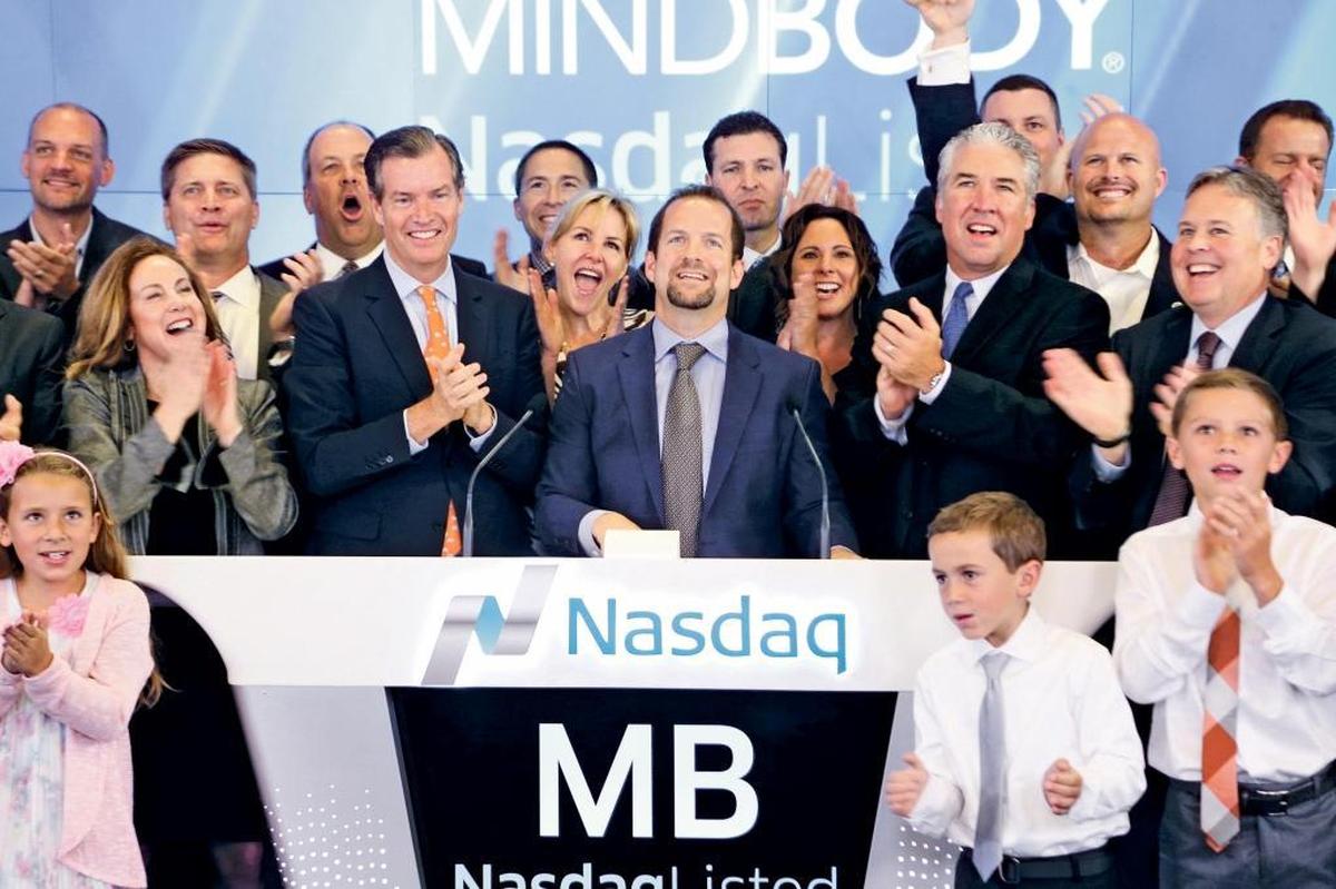 MindBody CEO Rick Stollmeyer rings the bell at the Nasdaq exchange on the first day of trading for his company’s stock in 2015.
