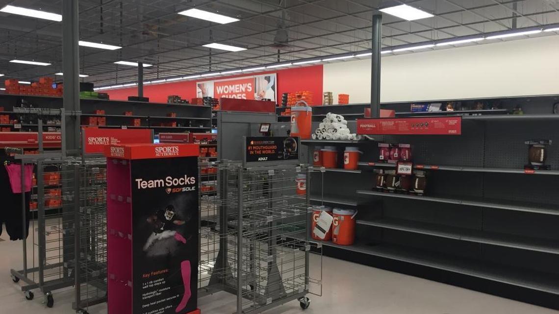 Shelves were bare at the San Luis Obispo Sports Authority store Thursday. The local store is among 19 in California that will be closed or sold.