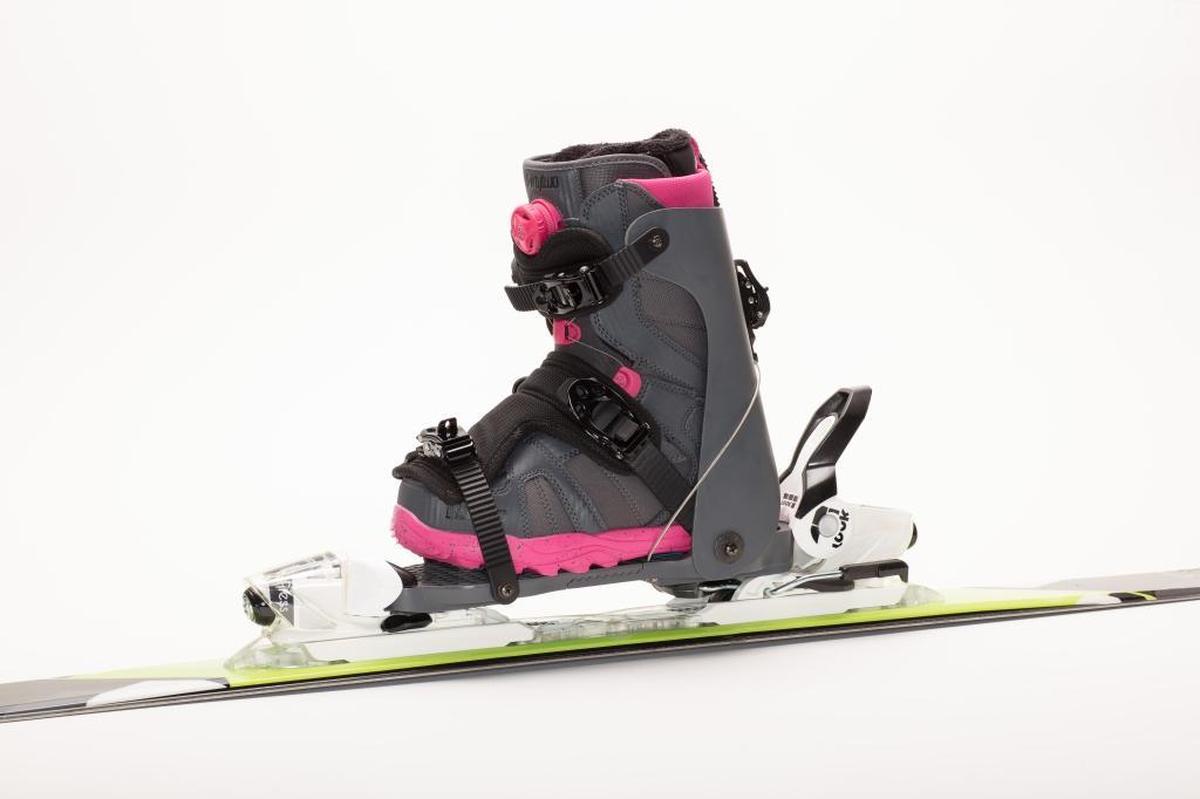 The MadJack is a patent pending adaption system that allows snowboard boots to be used in standard ski bindings.