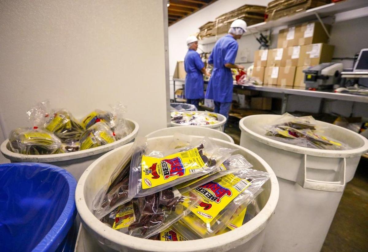 Containers of finished Cattaneo Bros. beef jerky are ready to be boxed up.
