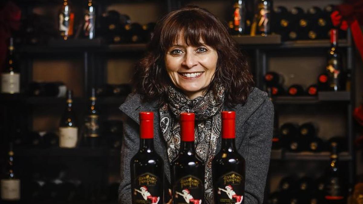 Lola Glossner of PasoPort Wine Co. with a Christmas Blend “Noel.”