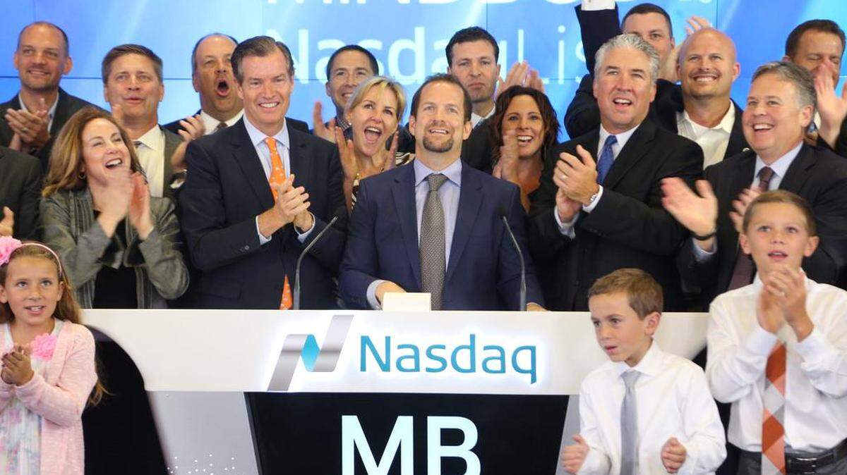 MindBody CEO Rick Stollmeyer celebrates as the San Luis Obispo software company goes public Friday, June 19.
