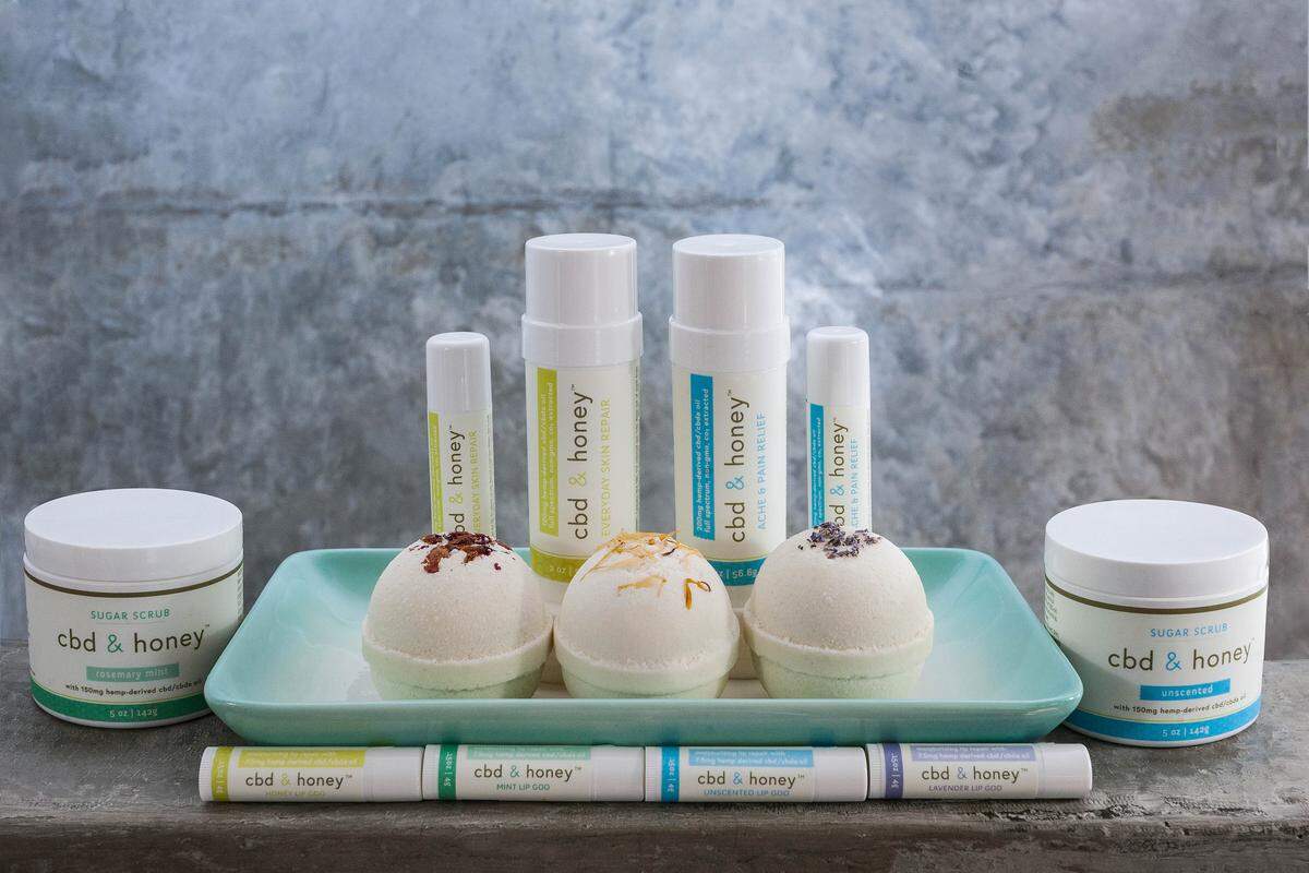 Life Elements’ CBD & Honey collection of health and beauty products includes bath bombs, lip balms, sugar scrubs and pain relief sticks.
