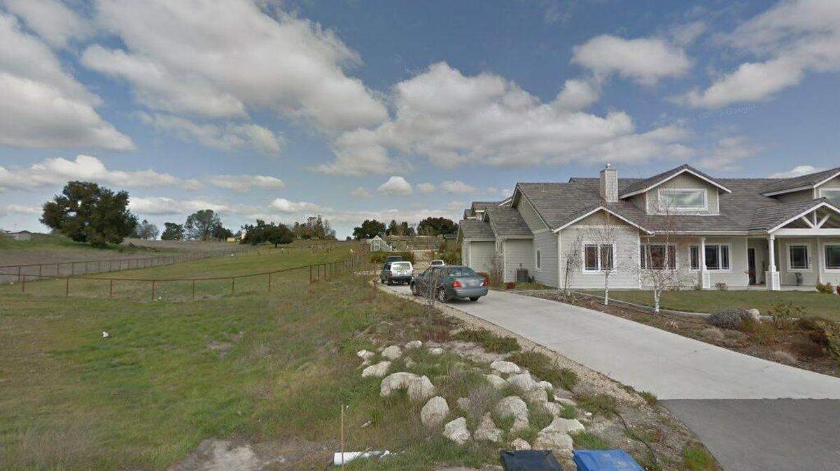 House on 9100 block of Harvest Way