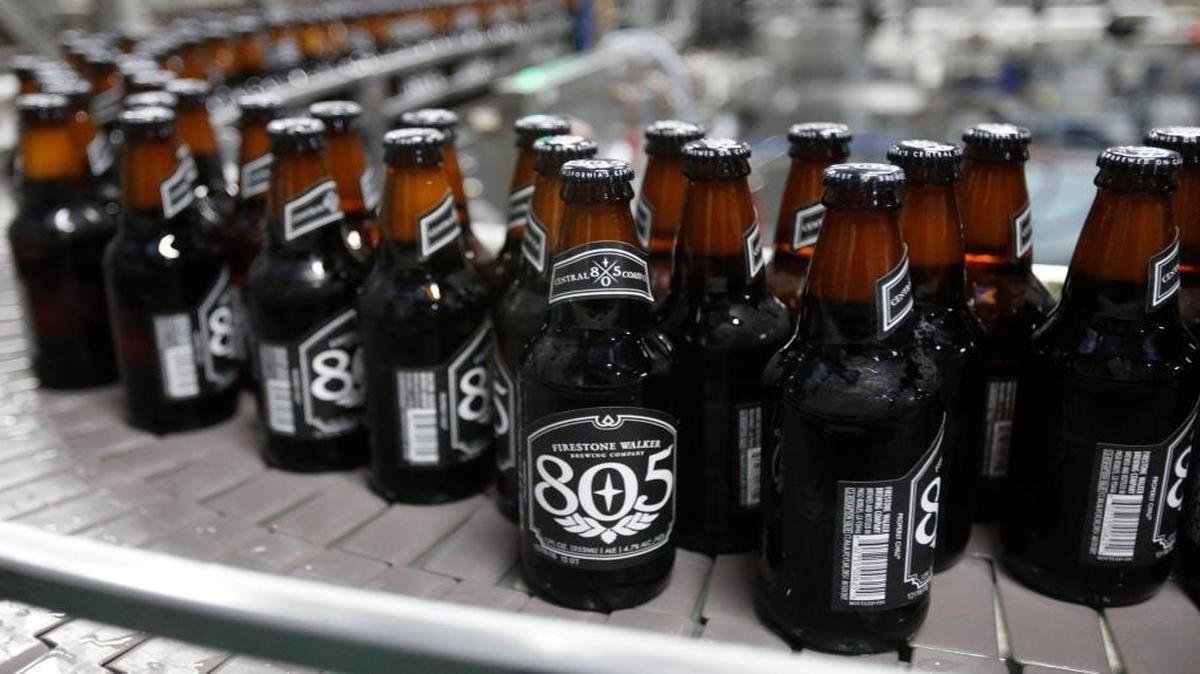 Bottles of 805 move to cases on the bottling line at Firestone Walker Brewing Co. in Paso Robles.