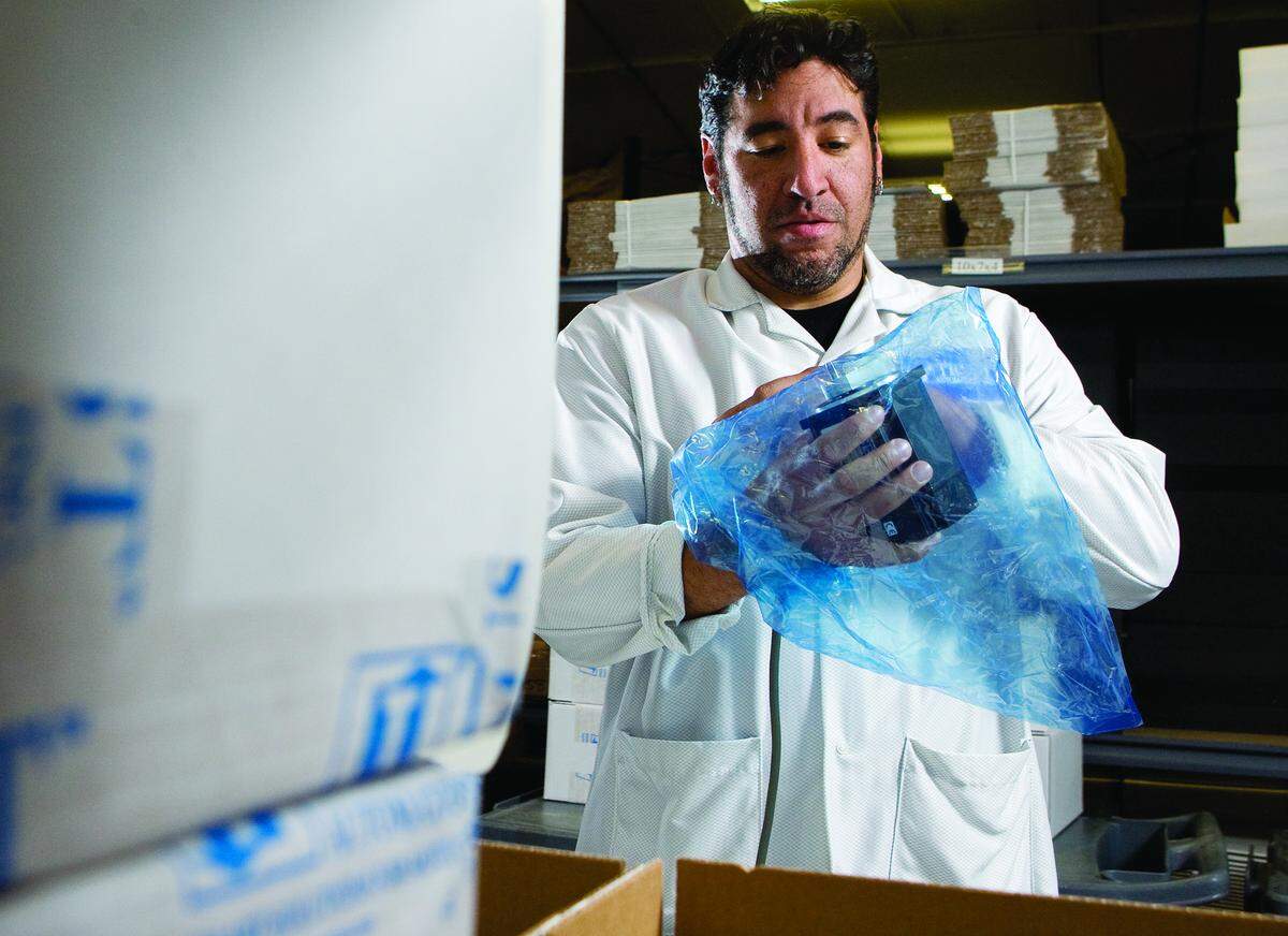 Trust Automation Inc. in San Luis Obispo ships internationally. Pete Rivera performs the last quality check before shipping an item. A new apprenticeship program will train locals for manufacturing jobs.