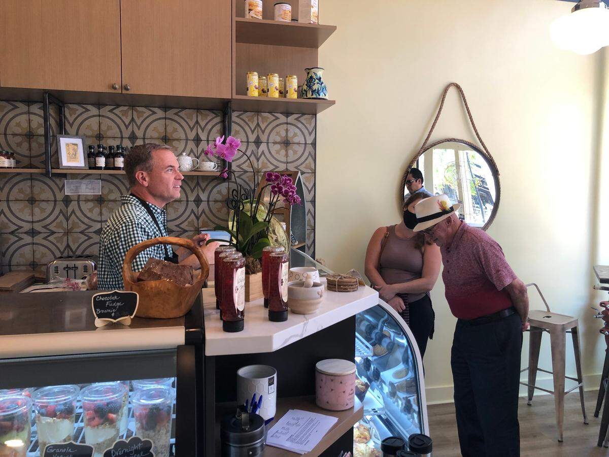 SLO Delicious owner Mike Marlineau greets customers on Thursday.