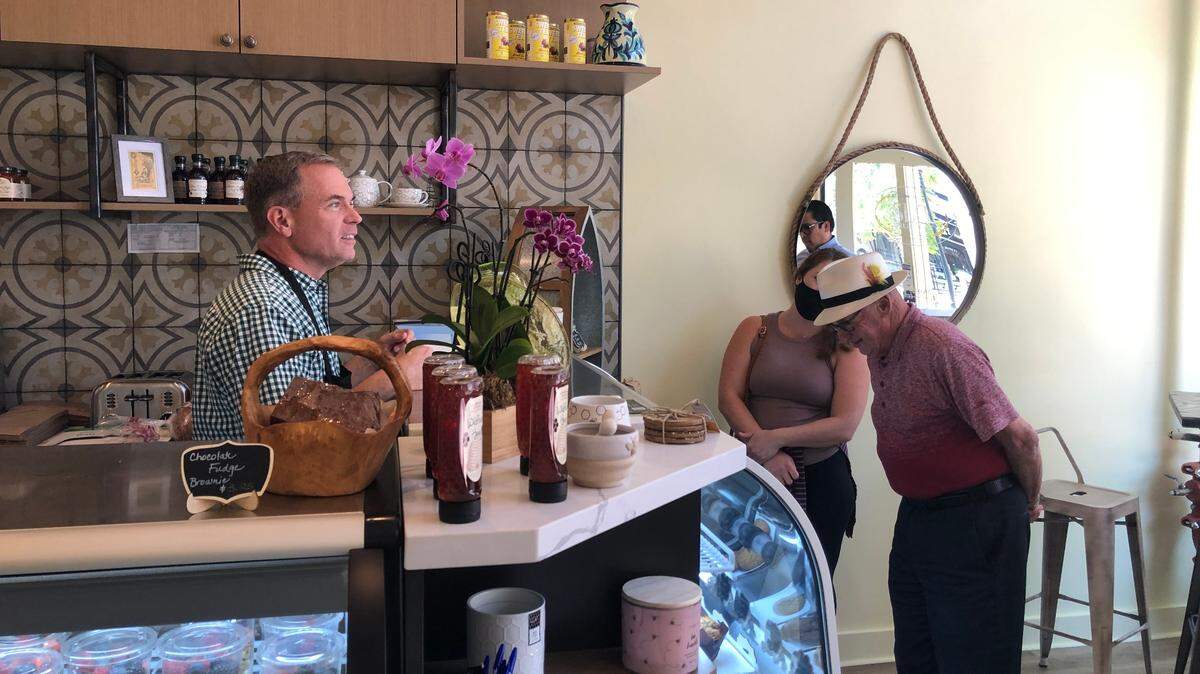 SLO Delicious Bake Shop owner Mike Martineau greets customers on Thursday, July 29, 2021. SLO Delicious Bake Shop is open on Garden Street in downtown San Luis Obispo.