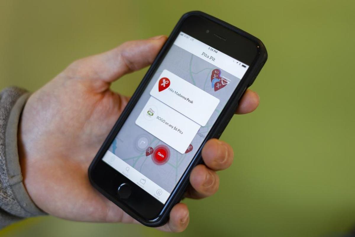 Cal Poly graduate Brett Foreman founded a new app called Kick-it Points that rewards users for doing activities with deals to local businesses.