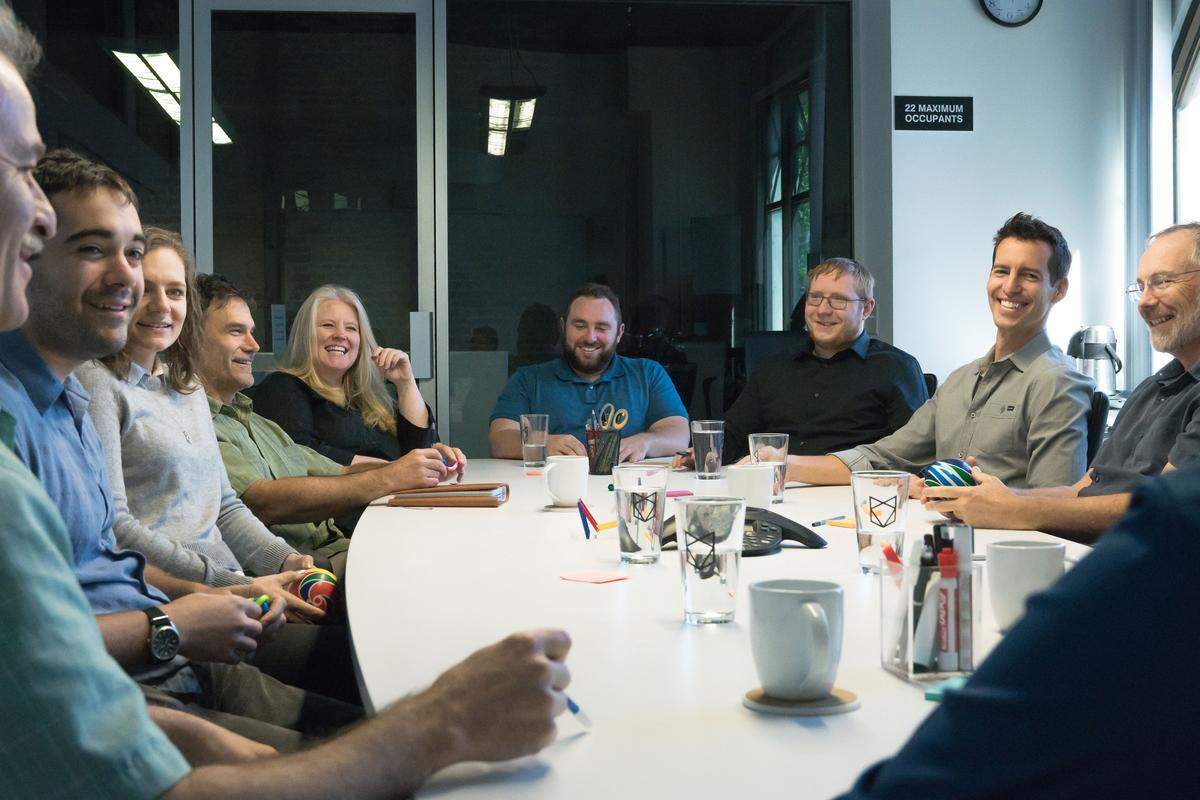The WhiteFox team convenes for a meeting.