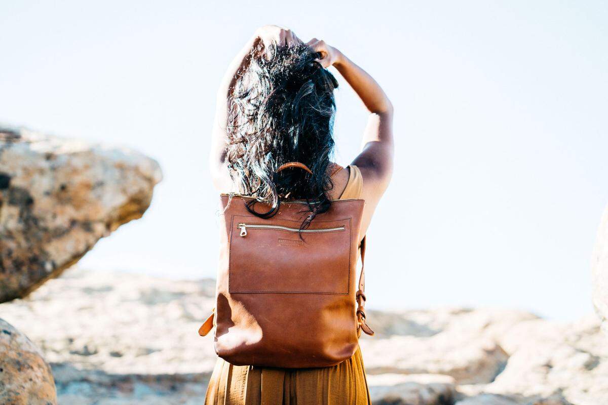 This image shows a bag made by the company Parker Clay, which his opening a second store in SLO.