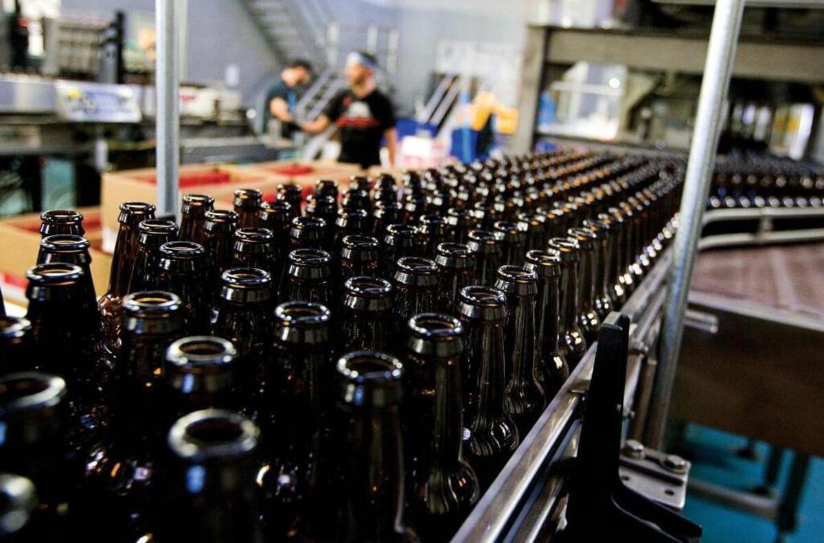 Bottling beer at the Firestone Walker Brewing Co. in Paso Robles in 2013. The brewery has announced that it will stop making popular beers Wookey Jack, Double Jack and Opal by the end of 2016.