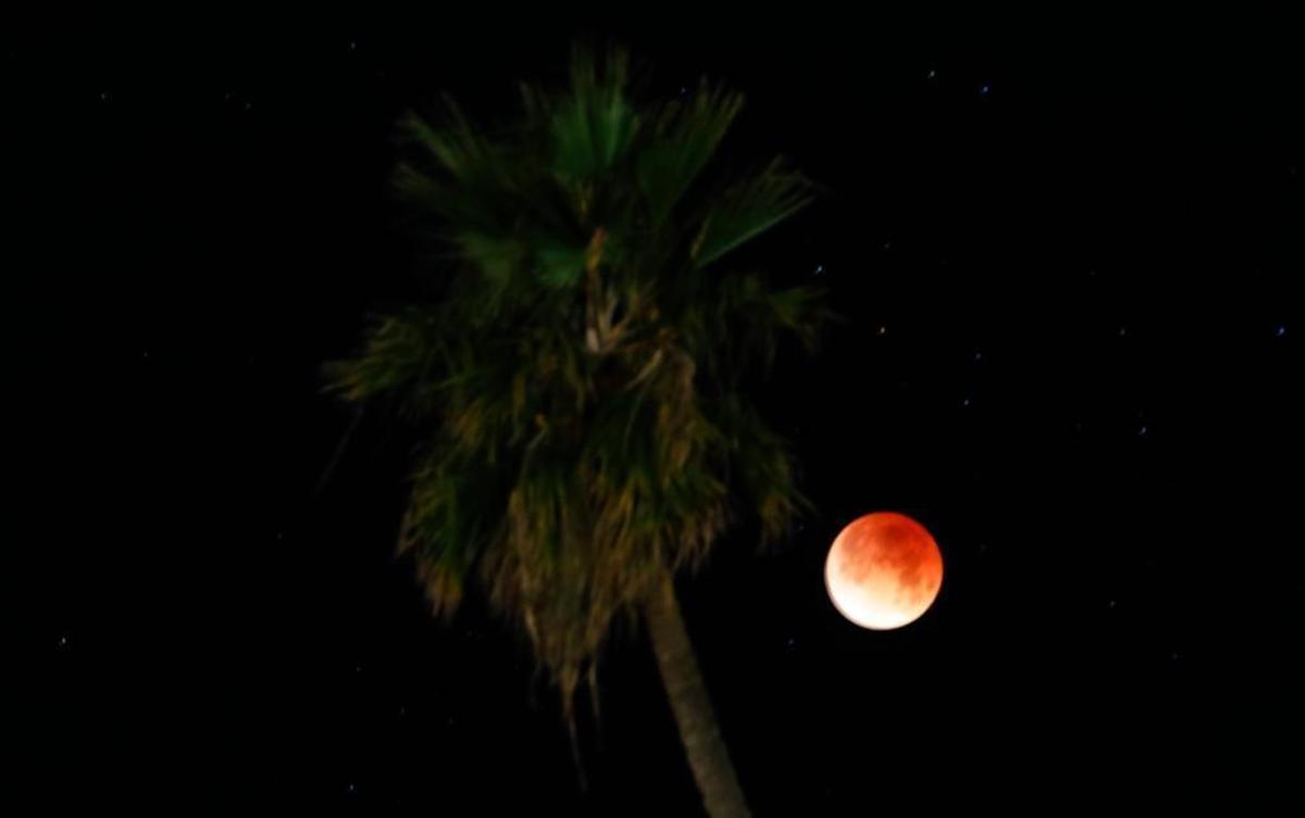 Blue blood supermoon over San Luis Obispo South Higuera Street.