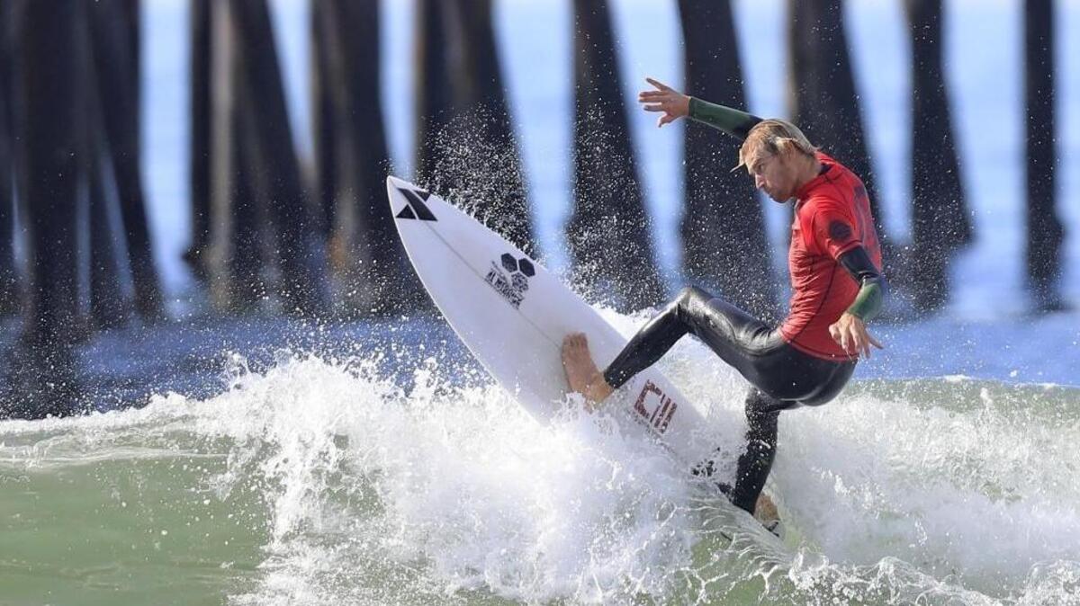 A surfer tears up the waves during the final day of the Pismo Beach Open surf contest on Sunday, November 19, 2017.