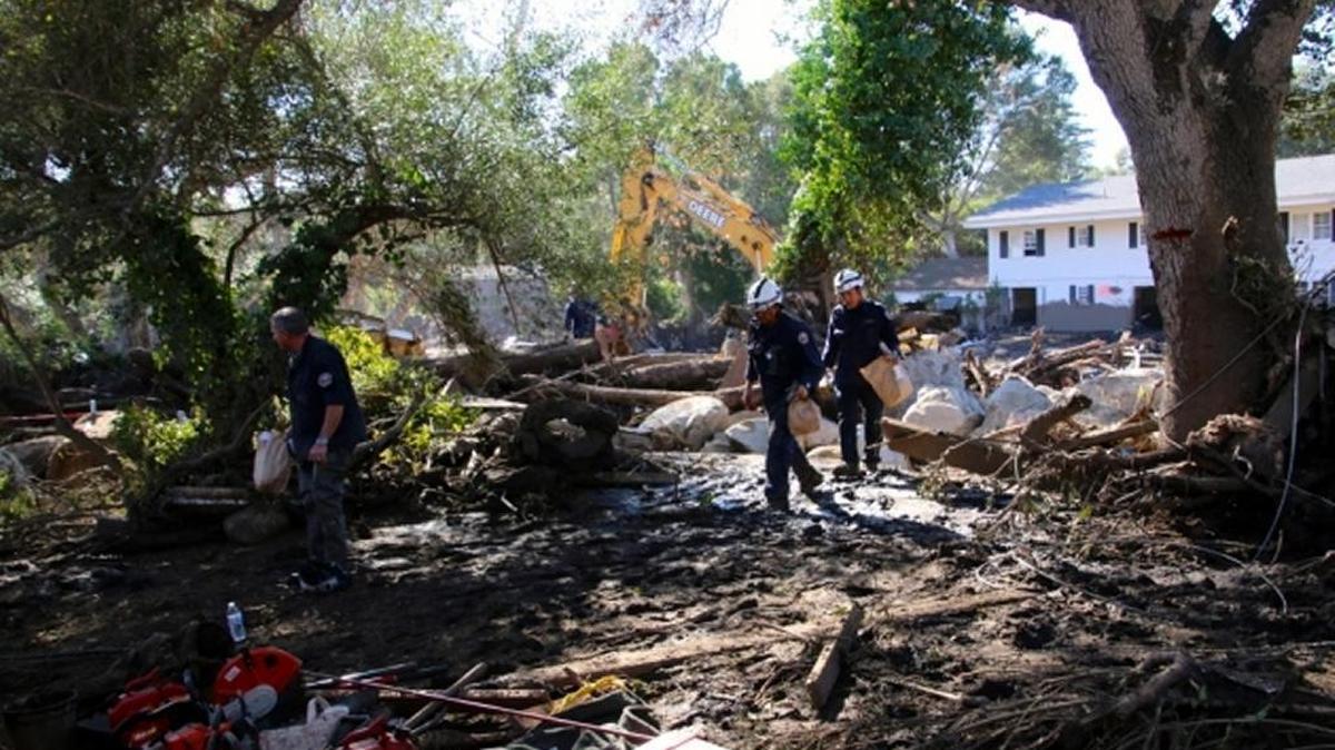 Just outside the front gates of Montecito’s Casa Dorinda retirement community, the Hot Springs/Olive Mill roads triangle is teeming with rescue and recovery workers and heavy equipment digging out a horrific scene of death and destruction from the Tuesday’s flash flooding in an area that authorities had designated as a voluntary evacuation zone. All residents and staff safely rode out the flooding and were moved off-campus two days later.