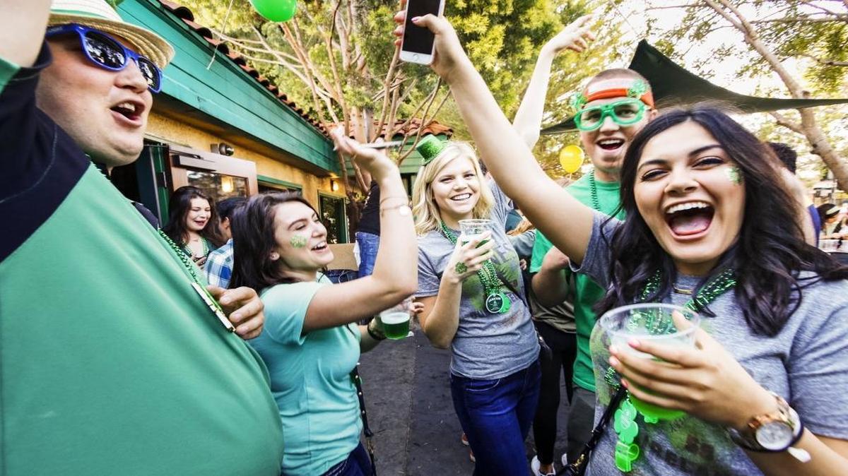 Donald Aardema, left, Taylor Margosian, Kaylyn Hofstee, Hans Gilkey and Faith Sierra celebrate St. Patrick’s Day at McCarthy’s Irish Pub in downtown San Luis Obispo in 2016. Under a proposed new law, bars like McCarthy’s could stay open as late as 4 a.m. California last call is currently 2 a.m.