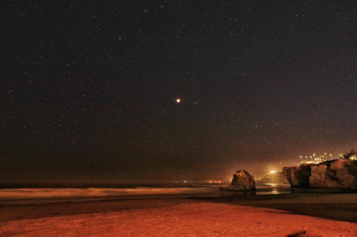 The super blue blood moon on Wednesday, Jan. 31, 2018, as seen from Pismo Beach.