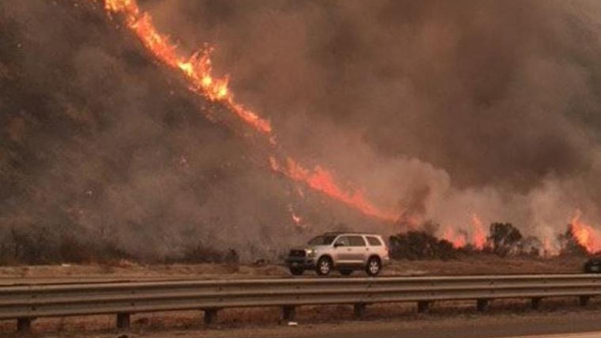 The Thomas Fire burning near Highway 101 near the Seacliff exit north of Ventura. All lanes remained open in both directions as of Wednesday morning.