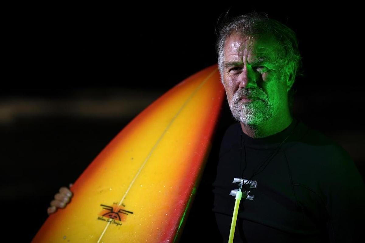 Helmut Igel after a night surf session under a full moon near San Diego on April 10, 2017.