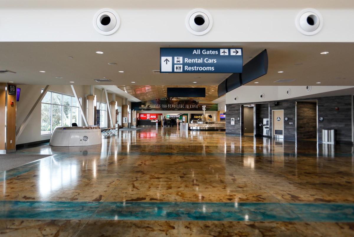 The number of travelers using San Luis Obispo County Regional Airport has dropped as much as 95% amid the coronavirus outbreak, leaving the terminal nearly deserted.
