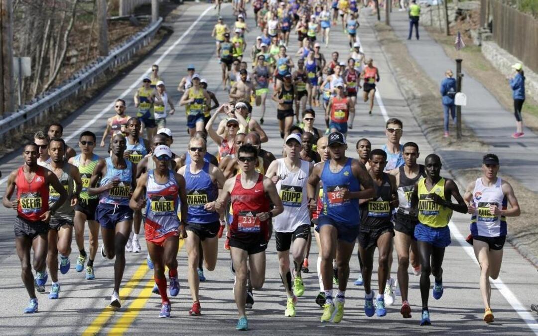 Elite male runners lead the field in the 121st Boston Marathon on Monday, April 17, 2017, in Hopkinton, Mass.