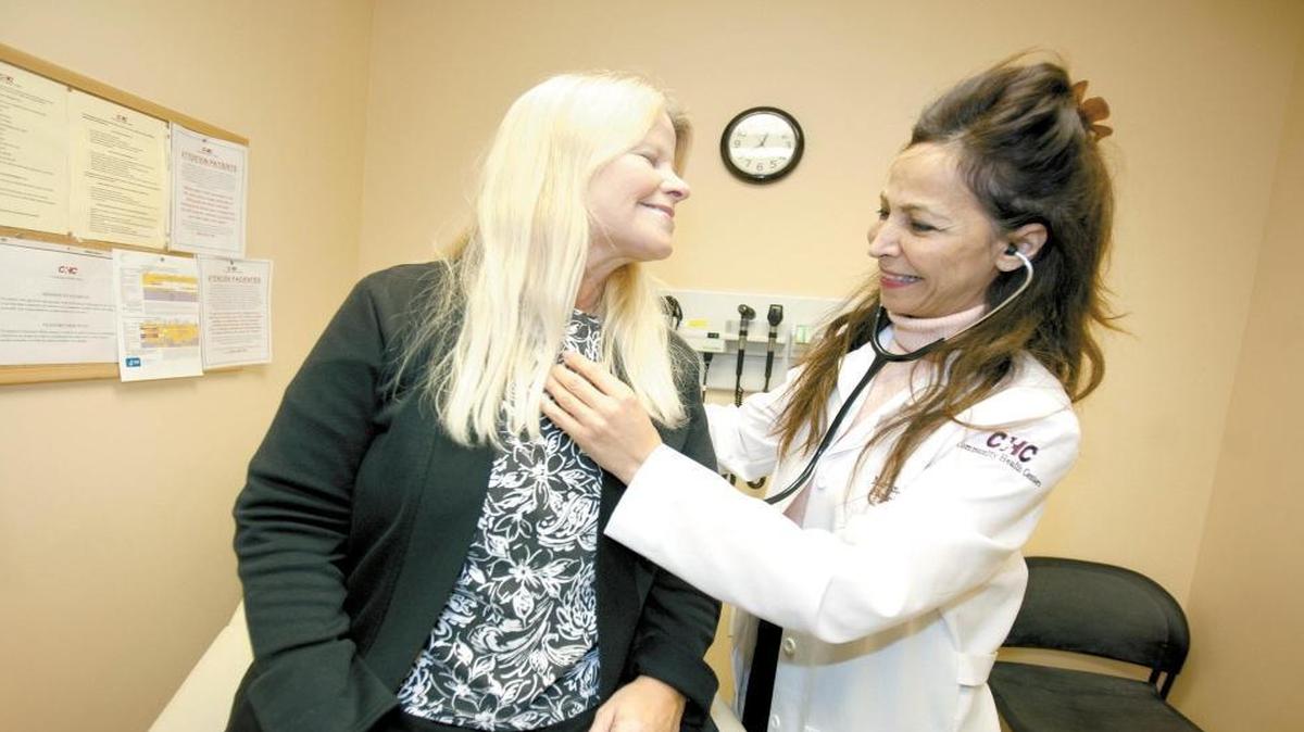 In 2014, Los Osos resident Sally Smith became eligible for Medi-Cal because of the Affordable Care Act. Here, in January 2014, she is examined by Dr. Maryam Corwin at the Community Health Centers location in San Luis Obispo.