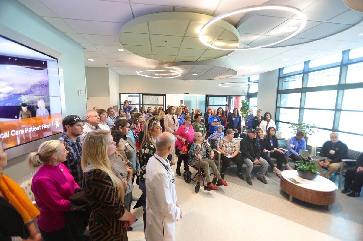 French Hospital Medical Center’s new Oppenheimer Family Center for Emergency Medicine was introduced at a preview event on Friday. Here, attendees gather in the lobby for a dedication.