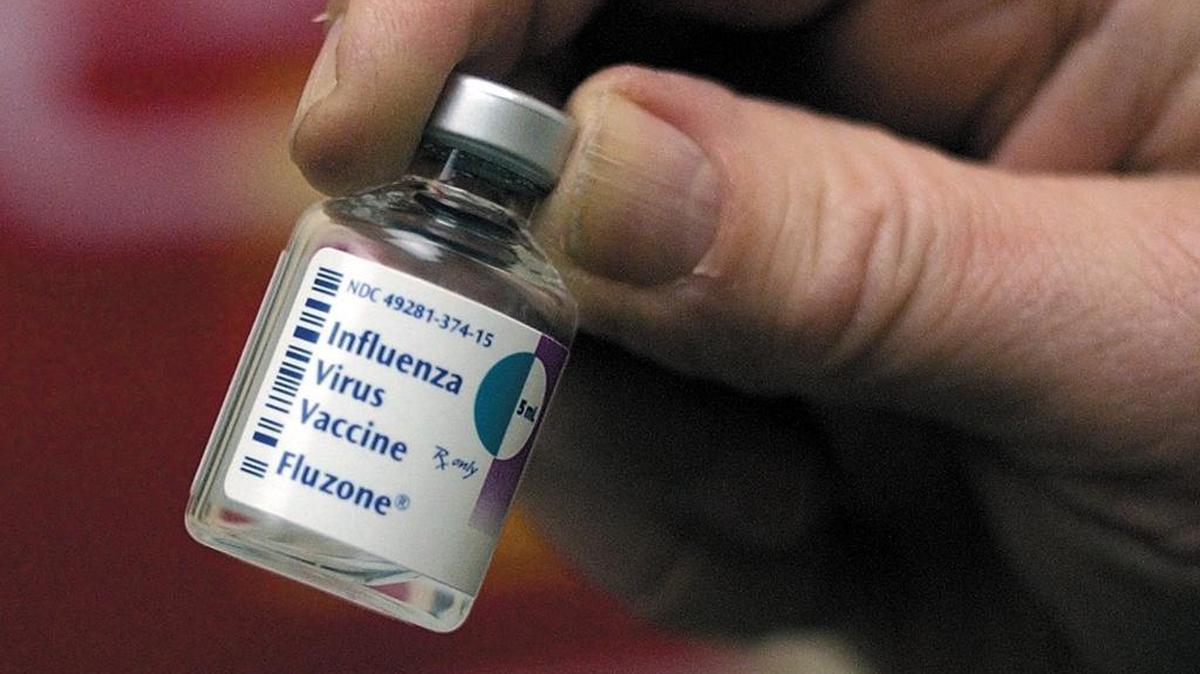 An empty bottle of flu vaccine.